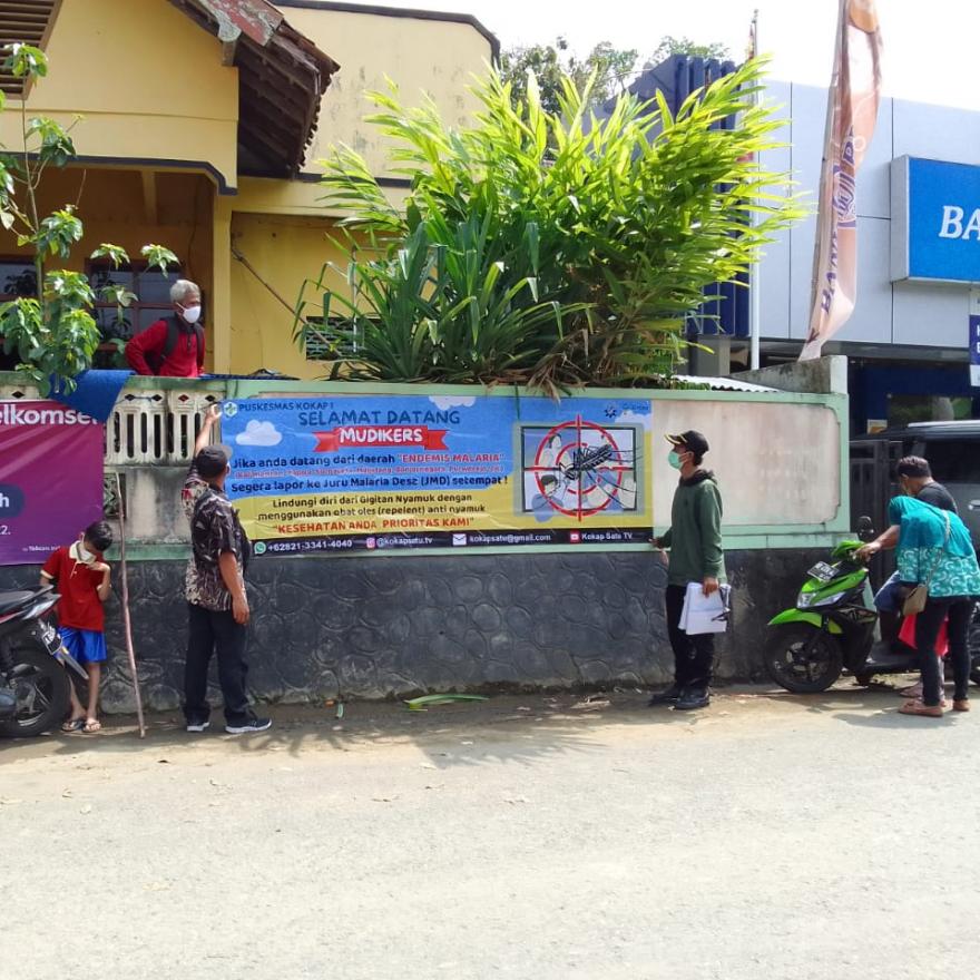 Sambut Mudikers JMD Pasang Banner Malaria 